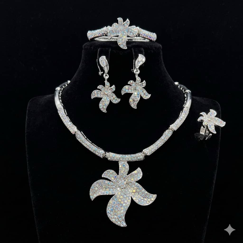 Silver Crystal Necklace Earrings and Ring.
