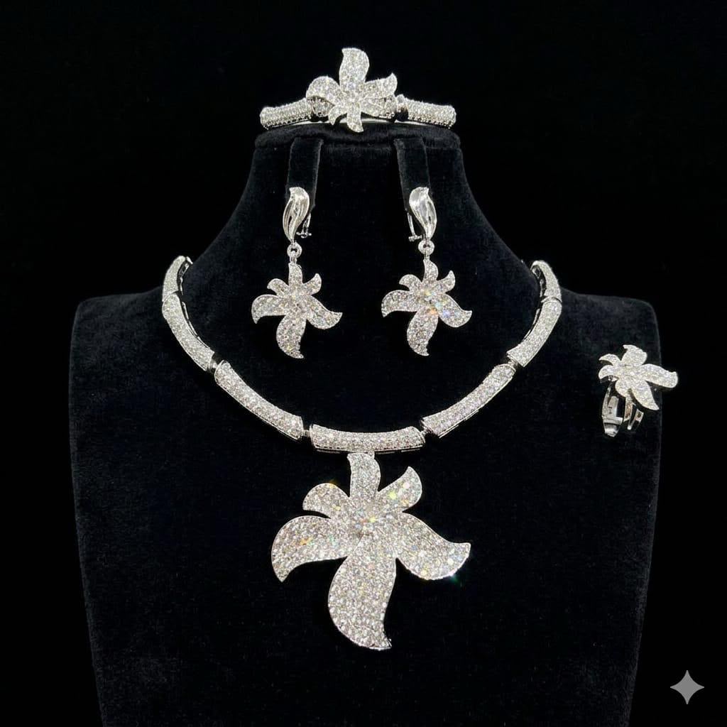 Silver Crystal Necklace Earrings and Ring.